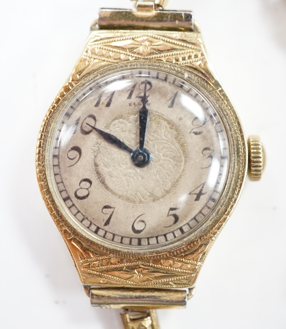 A lady's 14k manual wind wrist watch, with Arabic dial and engraved case, on a gold plated bracelet. Condition - poor